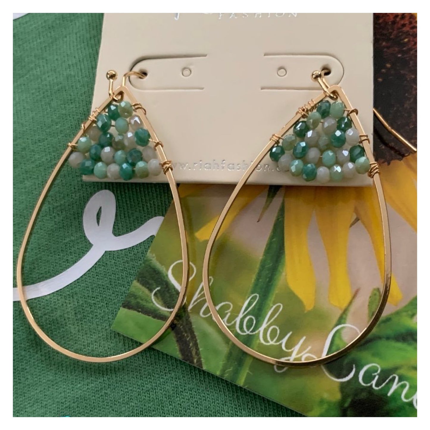 Beautiful gold designer earrings with green bead accents Shabby Lane