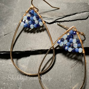 Beautiful gold designer earrings with blue bead accents  Shabby Lane   
