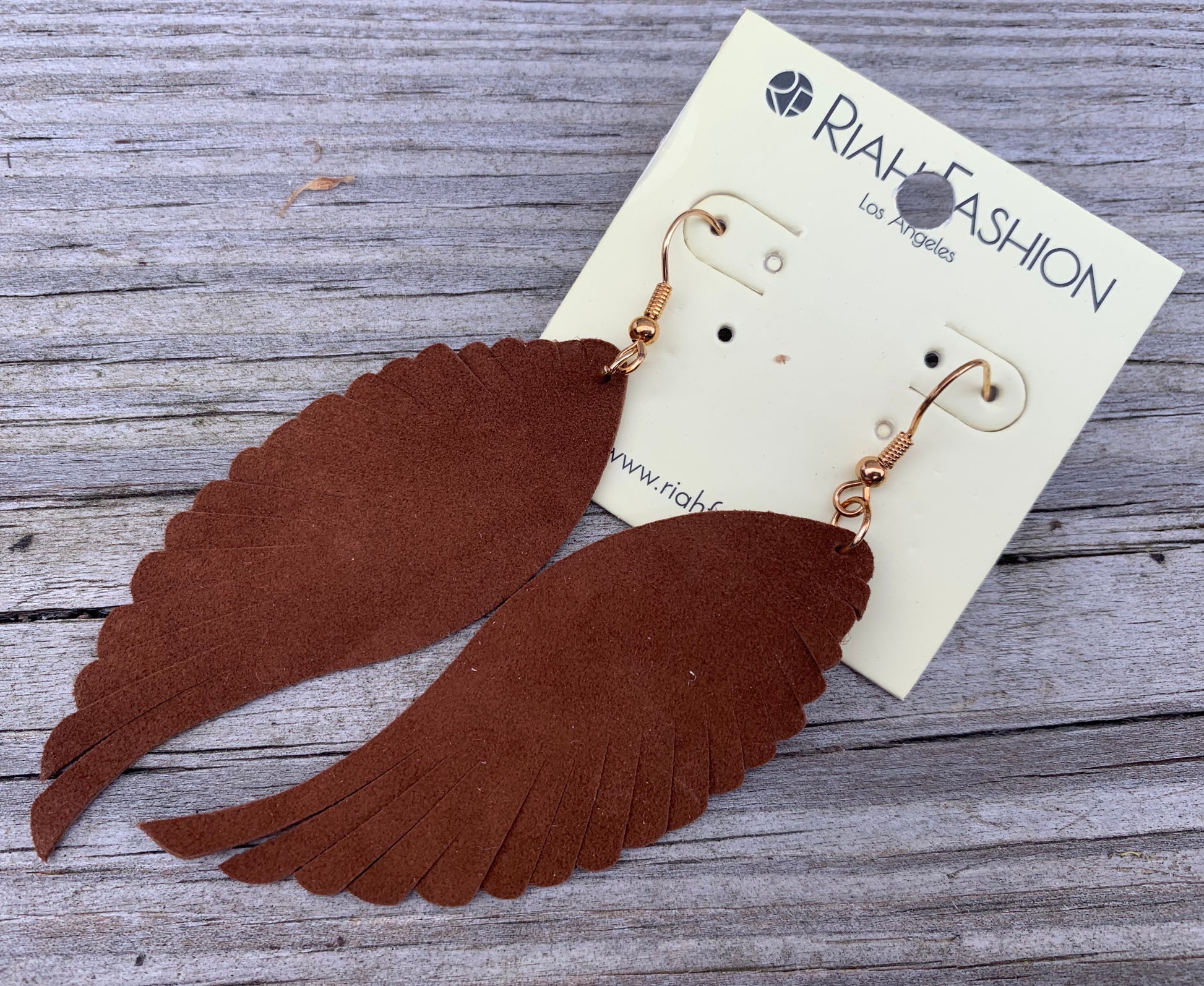 Leather  feathered earrings  Shabby Lane   