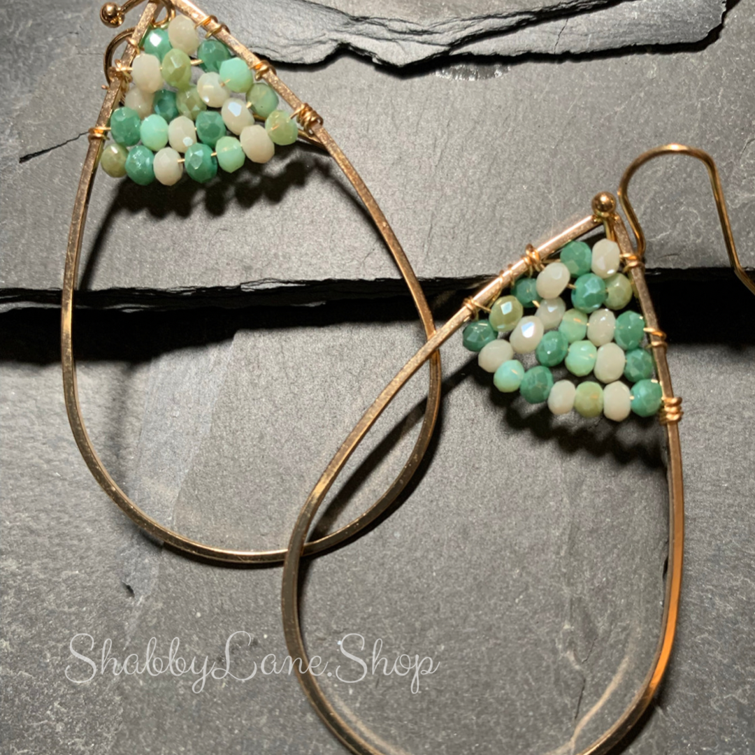 Beautiful gold designer earrings with green bead accents  Shabby Lane   